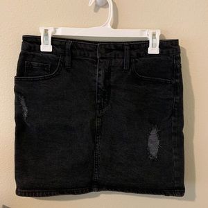 Distressed black jean skirt
